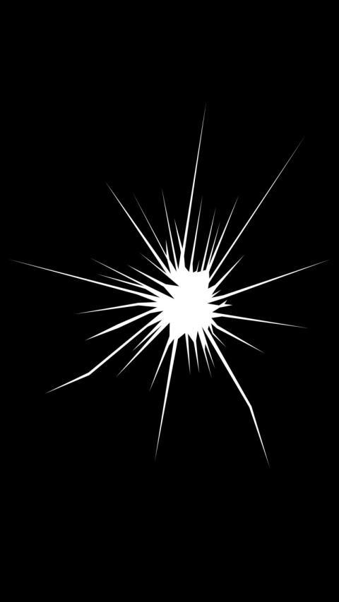 White starburst on black wallpaper