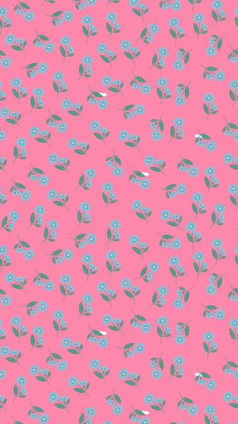 Pink and blue floral pattern with small blue flowers on pink preppy wallpaper